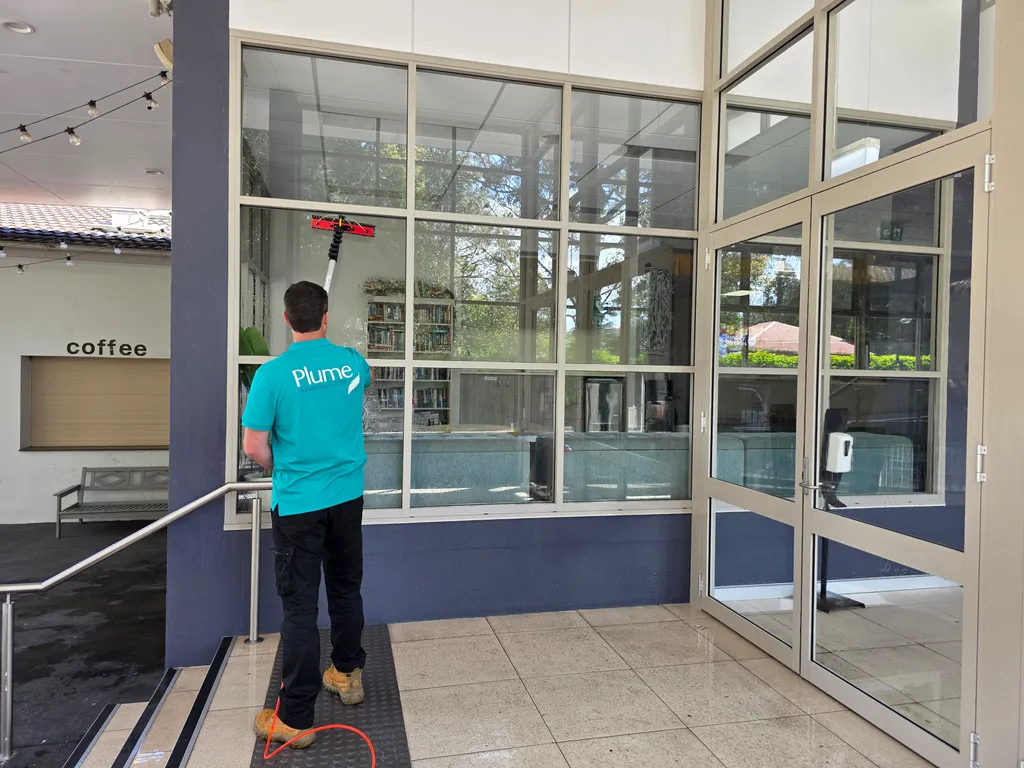 Joel cleaning church windows